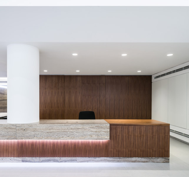 Timber and stone composition forming the entrance desk, 05 of 17