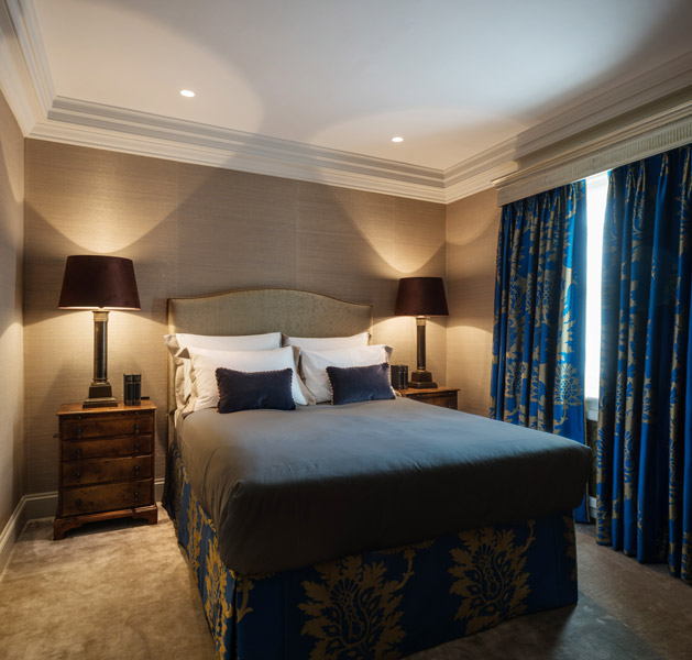 Bedroom interior showing bespoke fabric clad bed, 08 of 18