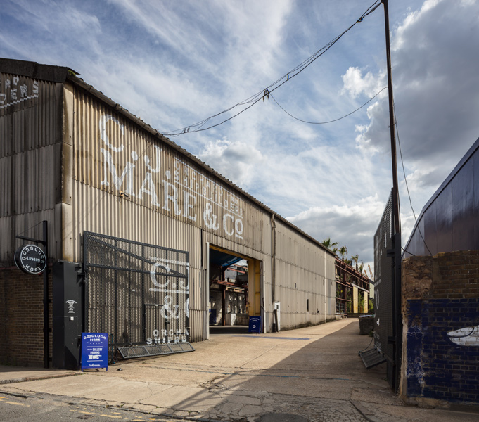 Entrance sequence preserves the feel of the original industrial structures, 01 of 20.