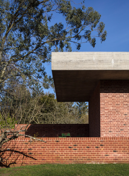 The building features a concrete roof slab and a brick terrace, 03 of 09.