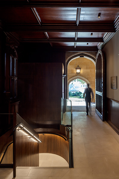 A beautifully-detailed staircase insertion complements the historic architecture, 04 of 07.