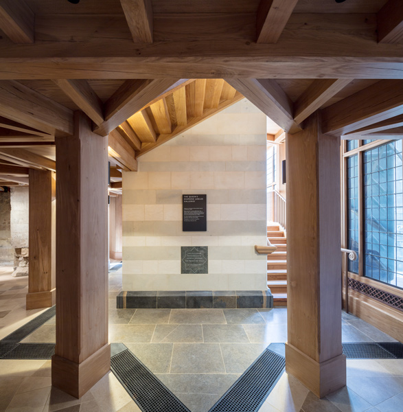 Entrance area features stone floor and timber structure, 07 of 13.
